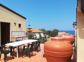One bedroom house at Marina di Caronia 200 m away from the beach with sea view furnished terrace and wifi Caronia